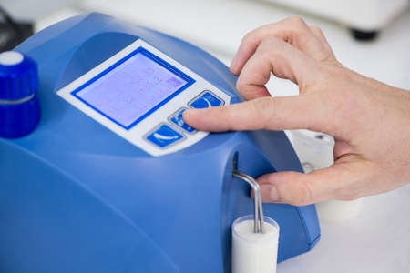 analysis and testing of dairy products on a modern device. test laboratory of a milk factory