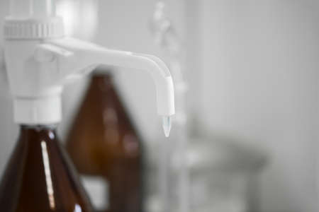 close-up of test pipette on blurred background. test laboratory of a milk factoryの写真素材