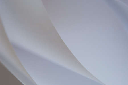 abstract background of a twisted sheet of white paper