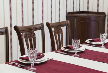 serving banquet table in a luxurious restaurant in red and white style