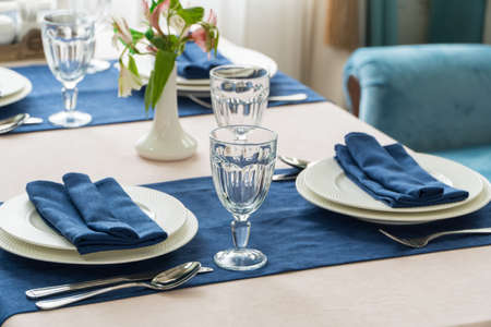 serving banquet table in a luxurious restaurant in blue and light style
