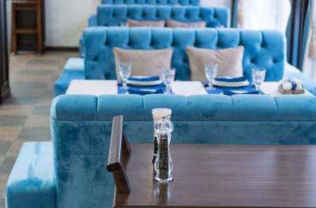 waiter's cart on the background of the served table in the restaurantの写真素材