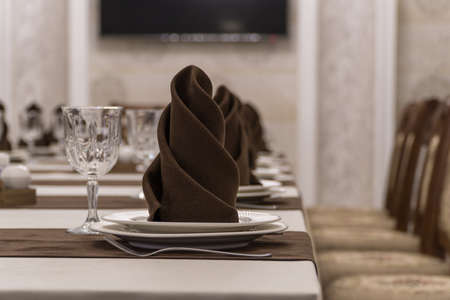 serving banquet table in a luxurious restaurant in brown and white styleの写真素材