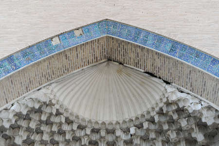 The ceiling in the form of a dome in a traditional ancient Asian mosaic. The details of the architecture of medieval Central Asiaのeditorial素材