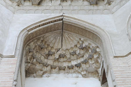 The ceiling in the form of a dome in a traditional ancient Asian mosaic. The details of the architecture of medieval Central Asiaのeditorial素材
