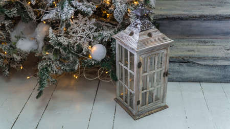 composition of Christmas decorations with fir tree and garlands. the sparkling lights