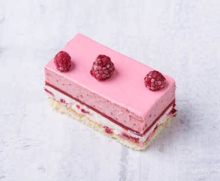 delicious strawberry cake on a white plateの写真素材