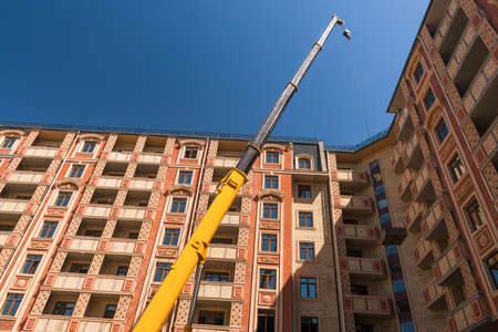 lifting machine on the construction site of a new building