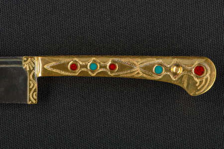 Decorative oriental knife decorated with precious gemstonesの写真素材