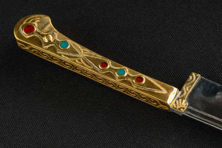 Decorative oriental knife decorated with precious gemstonesの写真素材