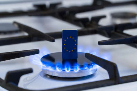 Shortage and gas crisis. Flag of the European Union on a burning gas stoveの写真素材