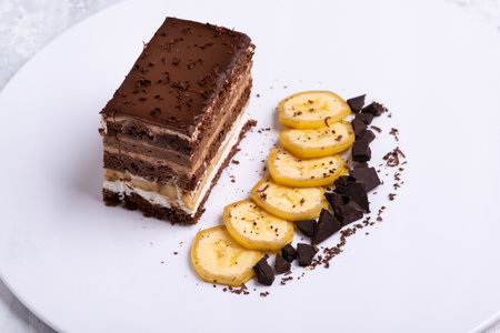 A serving of delicious chocolate cake pieces on a white plateの写真素材