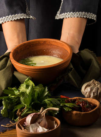 A shot of a dish in handsの写真素材