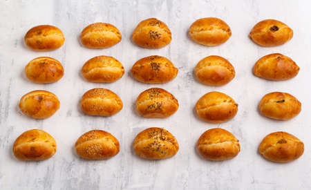 A top view of a number of tasty baked pastry on a table