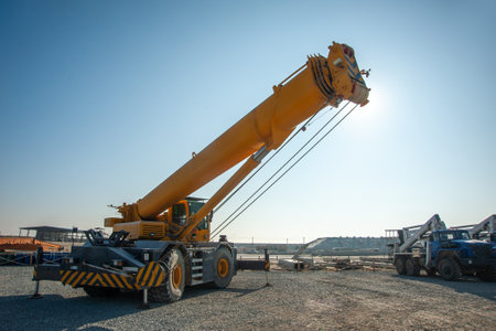 A Track crane working in an industrial construction area