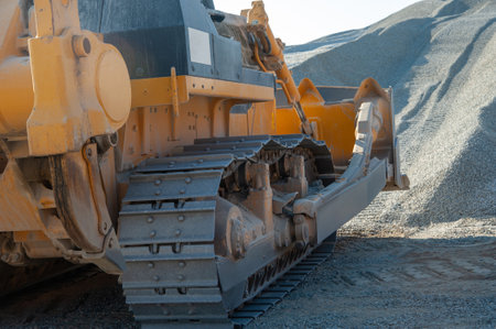 A closeup tractor working in an industrial construction area