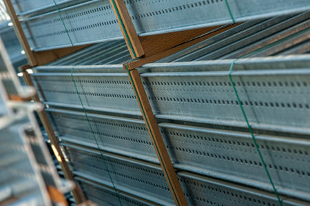 A close-up shot of metallic spare parts and panelsの写真素材