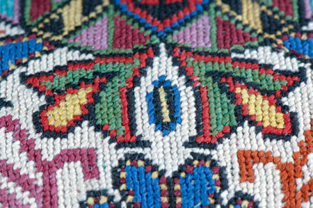 A closeup shot of national ornaments and patterns of Central Asia on a piece of cloth