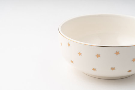 A ceramic bowl isolated on white backgroundの写真素材