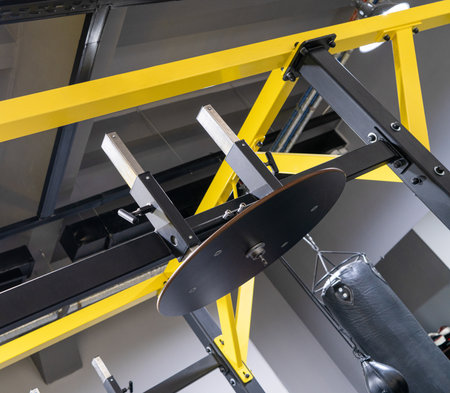 A vertical closeup of a boxing punch bag in the sports complex