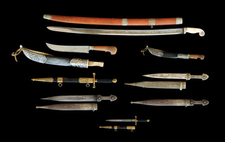 The Set of antique knives and daggers isolated on a black background, Central Asian, Uzbekistan