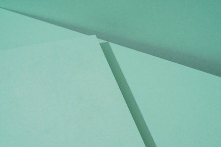 Colorful background from green paper with shadow. abstract geometricの写真素材
