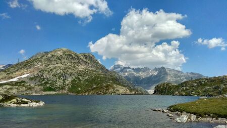 Photo of a lake and mountains in the backgroundの写真素材