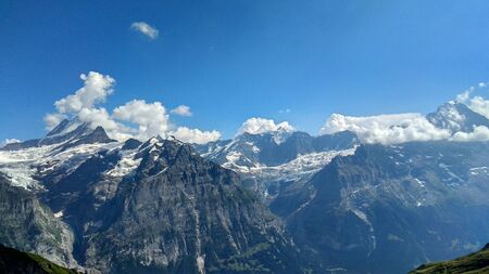View of mountains with snow in Switzerlandの写真素材