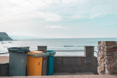 Photo of trash bins near the beachの写真素材