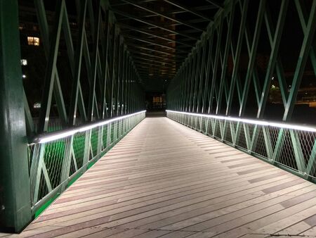 Photo of an illuminated bridge in Madrid during the night