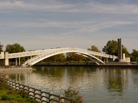 Photo of a bridge and a river in a parkの写真素材