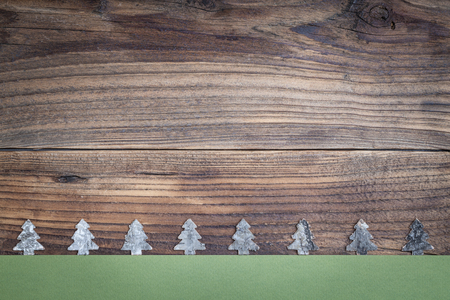 Christmas tree on old wooden backgroundの写真素材