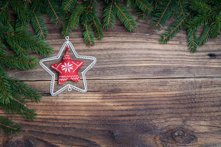 Pine tree with star on old wooden backgroundの写真素材