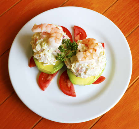 Exquisite seafood stuffed avocado with shrimp