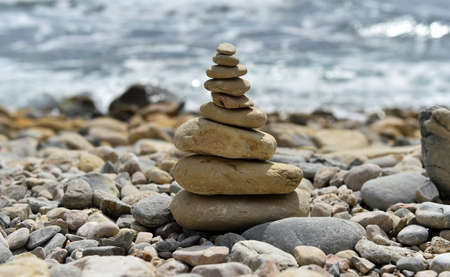 tower of stones on the seaの写真素材