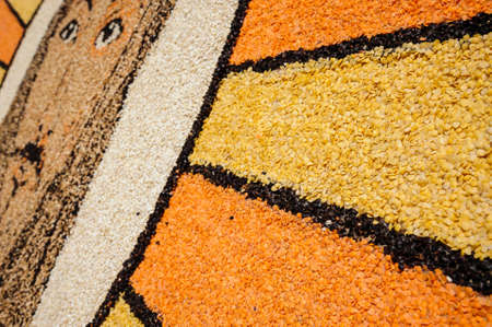 Castelluccio di Norcia, Umbria, Italy - June 21, 2020: picture depicting Jesus made with seeds and colored lentils, outside Piano Grande near Castelluccio di Norcia during the flowering, June 2020.のeditorial素材