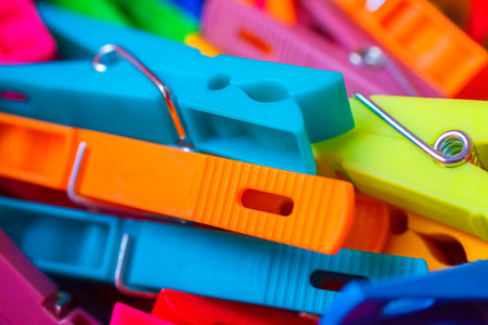 macro detail of a lot of colored clothespinsの写真素材