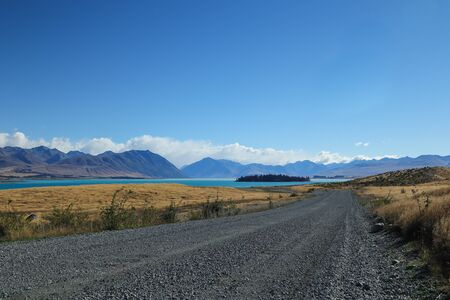 Solitary road with a colourful landscape