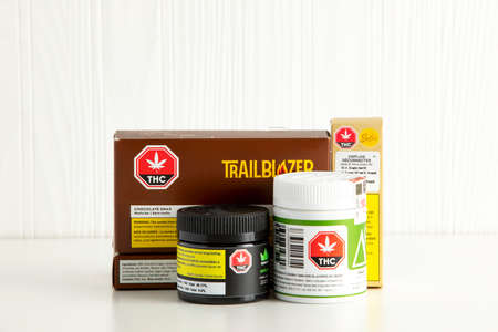 Calgary, Alberta, Canada. Oct 15, 2020. Several Cannabis packages containers of various licensed brands of legal cannabis in Canada.のeditorial素材