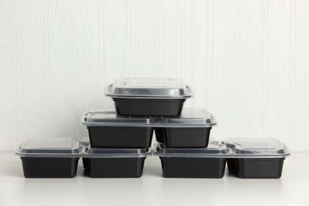Plastic containers on a white background. Recycling plastics. Reusable packaging. Disaster planet...