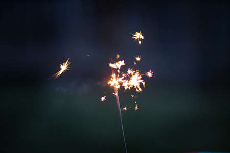 brilliant sparkler during night