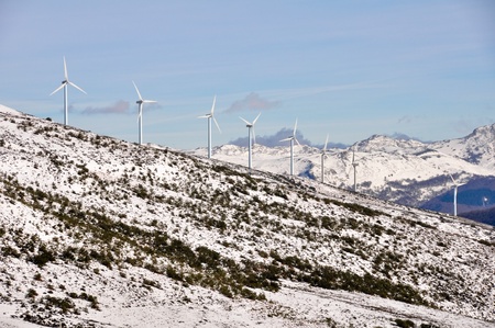 Wind turbines farm in winter, Elgea range,  Basque Country 
