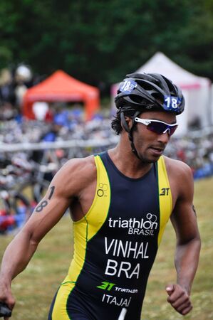 Dario Thiago Vinhal on transition zone in the Long Distance Triathlon World Championships, July 29, 2012 in Vitoria Gasteiz, Basque Country, Spain のeditorial素材
