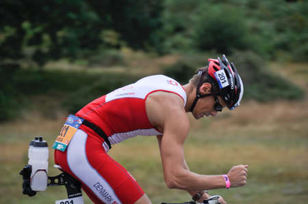 Mathias Sorgaard competing in the cycling section of the Long Distance Triathlon World Championships, July 29, 2012 in Vitoria Gasteiz, Basque Country, Spain のeditorial素材