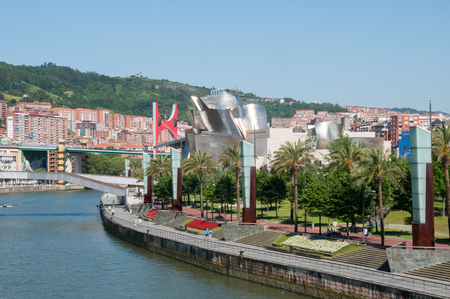 Nervion river, La Salve bridge and Guggenheim Museum on June 12, 2013 in Bilbao, Spain  Modern city near Nervion river のeditorial素材