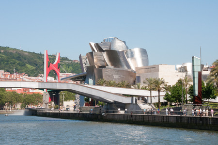 Nervion river, La Salve bridge and Guggenheim Museum on June 12, 2013 in Bilbao, Spain  Modern city near Nervion river のeditorial素材