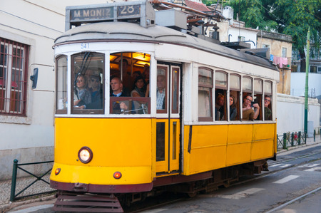 Famous tram 28 in Alfama district on October 26, 2013 in Lisbon, Portugal The Lisbon tramway network operates since 1873 のeditorial素材