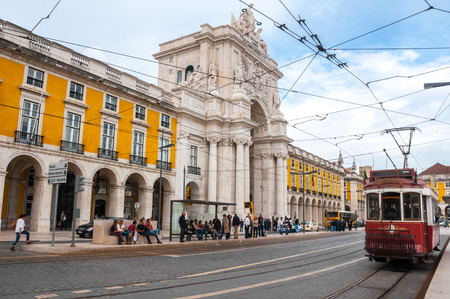 Traditional tram at the Commerce square on October 25, 2013 in Lisbon, Portugal The Lisbon tramway network operates since 1873 のeditorial素材
