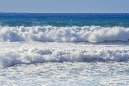 Waves breaking on the shore of Madeira