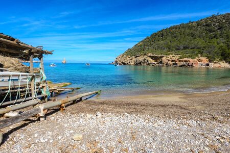 Benirras beach with fishermen's huts, Ibiza island, Spainの写真素材